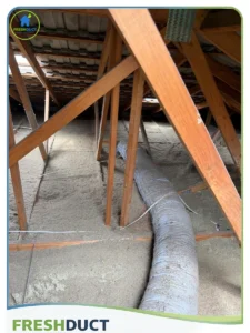 Old blow in insulation in attic
