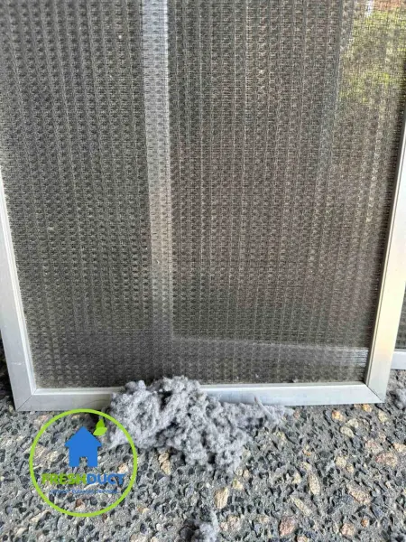 A dirty vent cover, mid-service