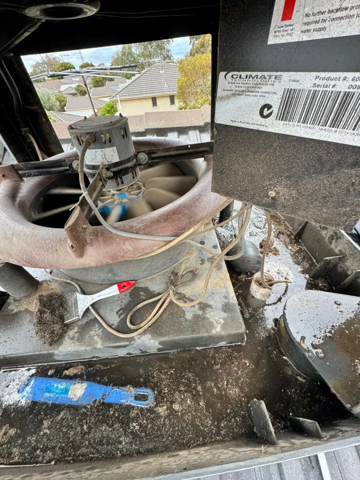 Evaporative cooler on a Melbourne rooftop, caked in grime before its FreshDuct service