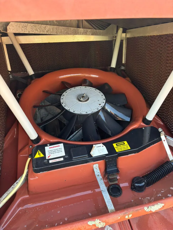 The same evaporative cooler fan after cleaning, blades and hub clean